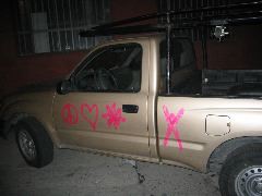 mark's truck shows he is a  burningman peace and love, or was thatfrom LA vandals? hmmmm